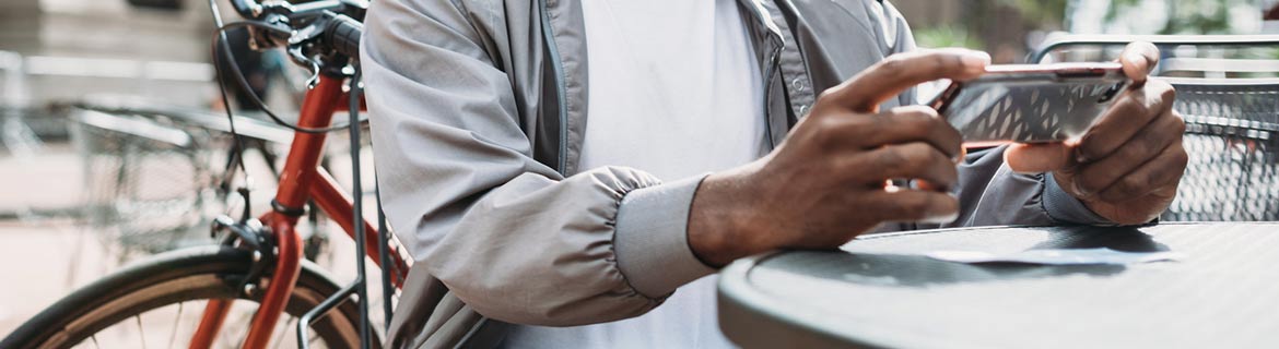 Man taking photo of check