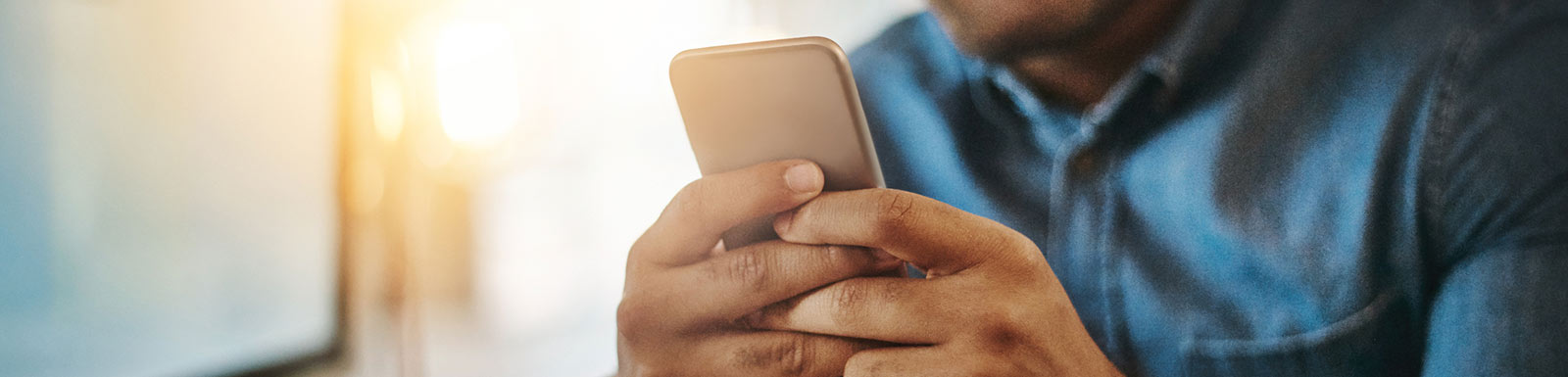 Man holding mobile phone