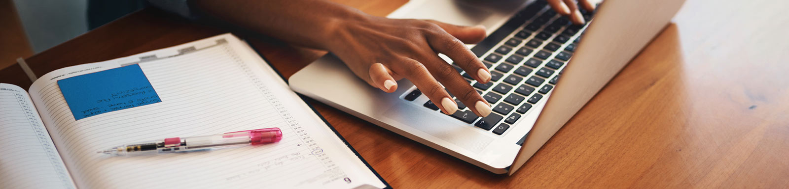 Woman's hands on laptop